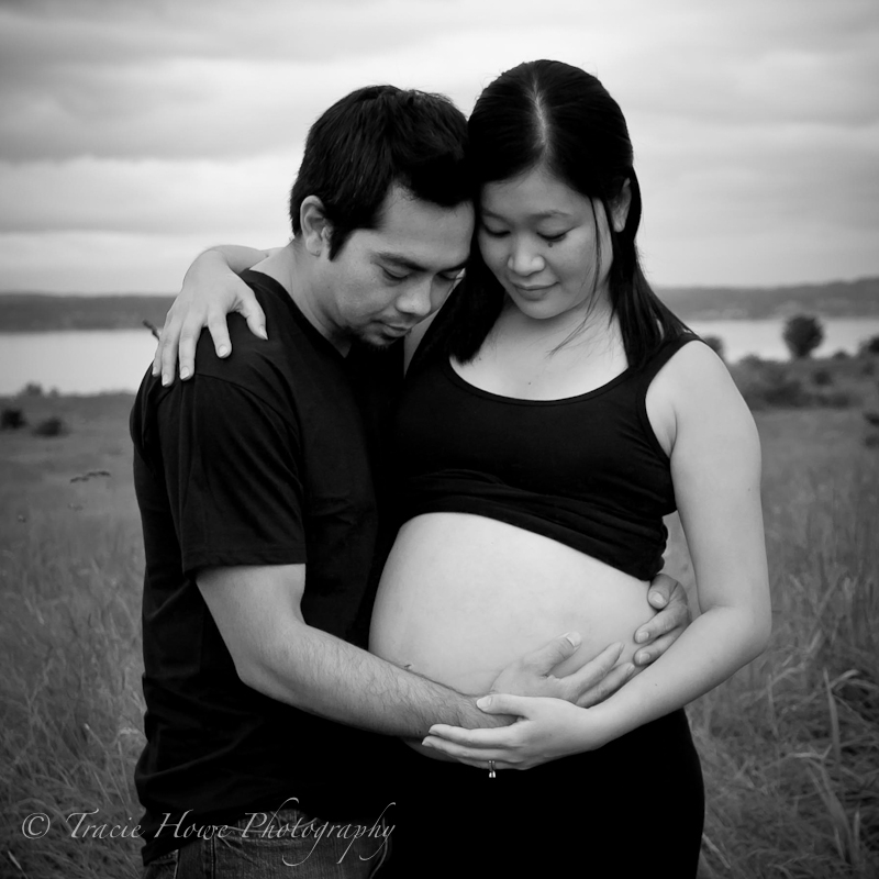 Portrait of pregnant woman and husband at Discovery Park