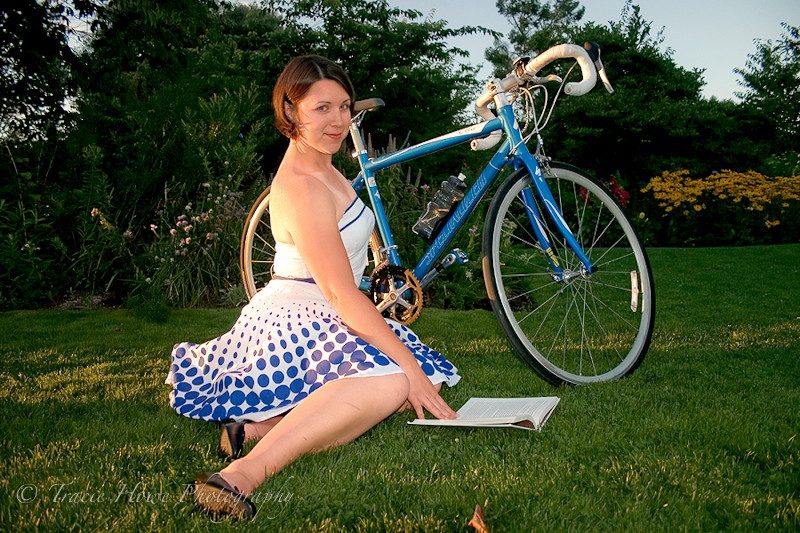 Portrait of woman with book and bike in Seattle