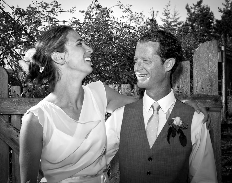 Photo of bride and groom laughing on Lopez Island