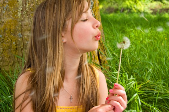 Portrait of little girl and flower