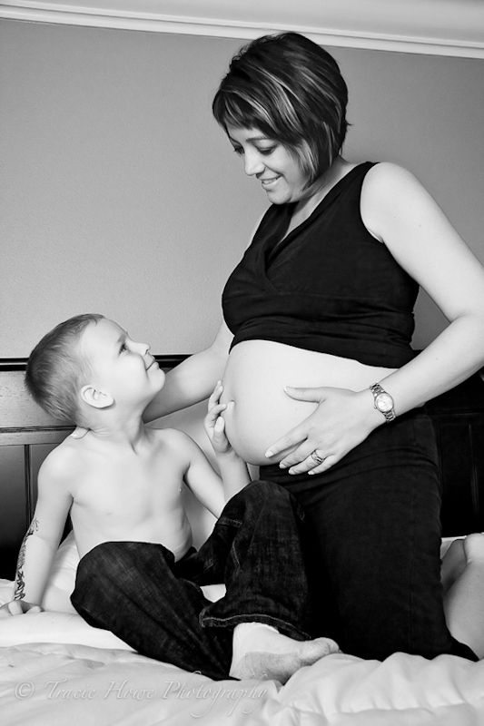 Portrait of pregnant woman and her son