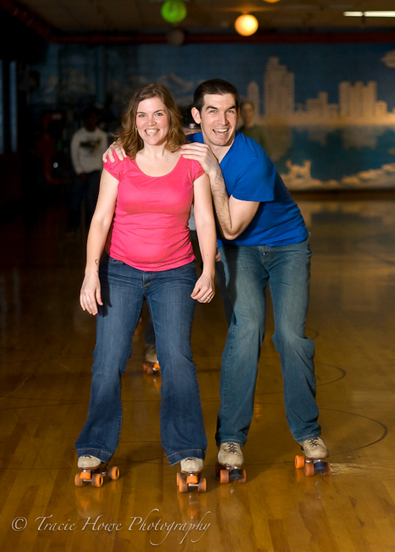 Portrait of engaged couple on roller skates