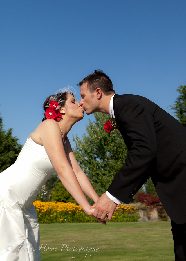 Photo of bride and groom kissing