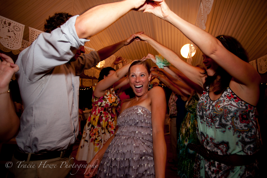 Photo of guests dancing at wedding