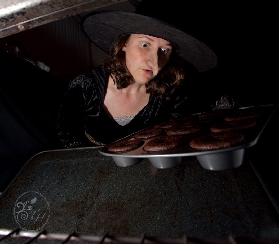 Photo of a witch baking from a Halloween themed self-portrait