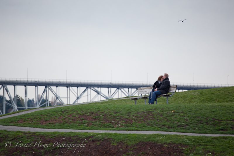 Engagement photo of couple at Gasworks Park in Seattle
