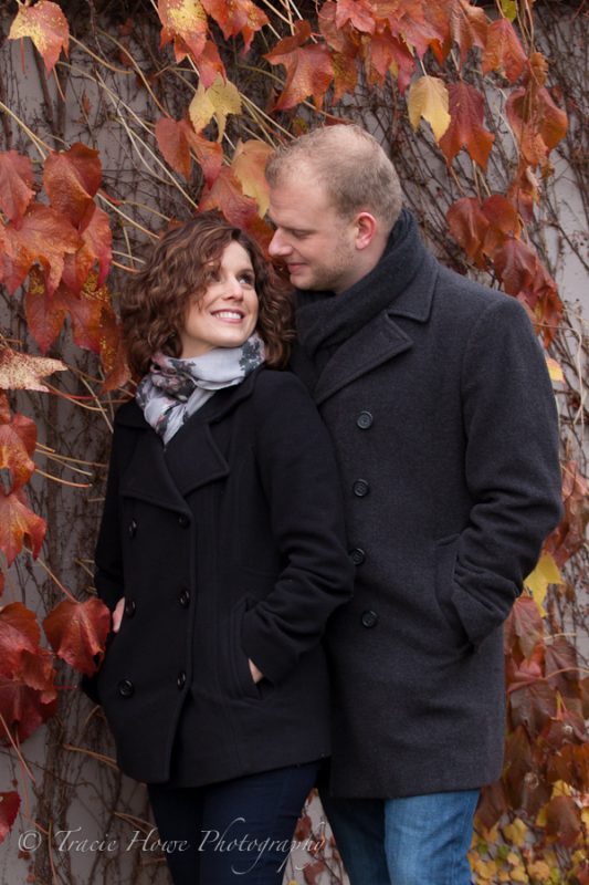 Engagement photo of couple during the fall at Gasworks Park in Seattle