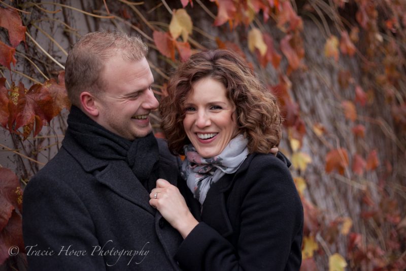 Engagement photo of couple during the fall at Gasworks Park in Seattle