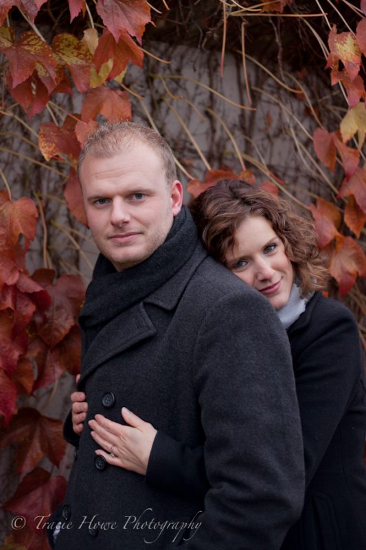 Engagement photo of couple during the fall at Gasworks Park in Seattle