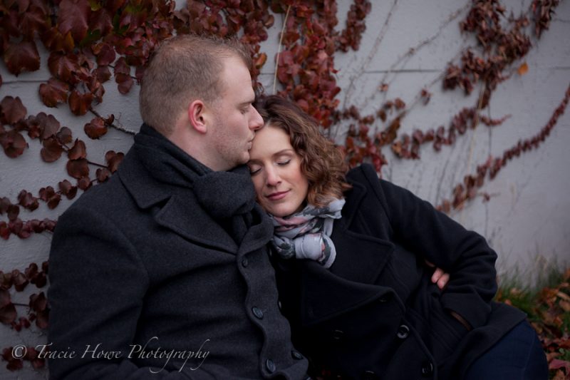 Engagement photo of couple during the fall at Gasworks Park in Seattle
