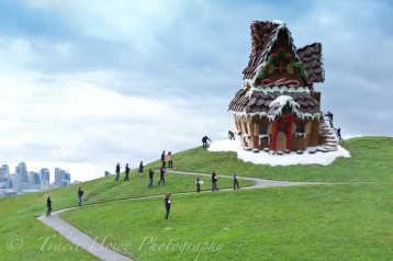 Forced perspective photo of giant gingerbread house on hill at Gasworks Park