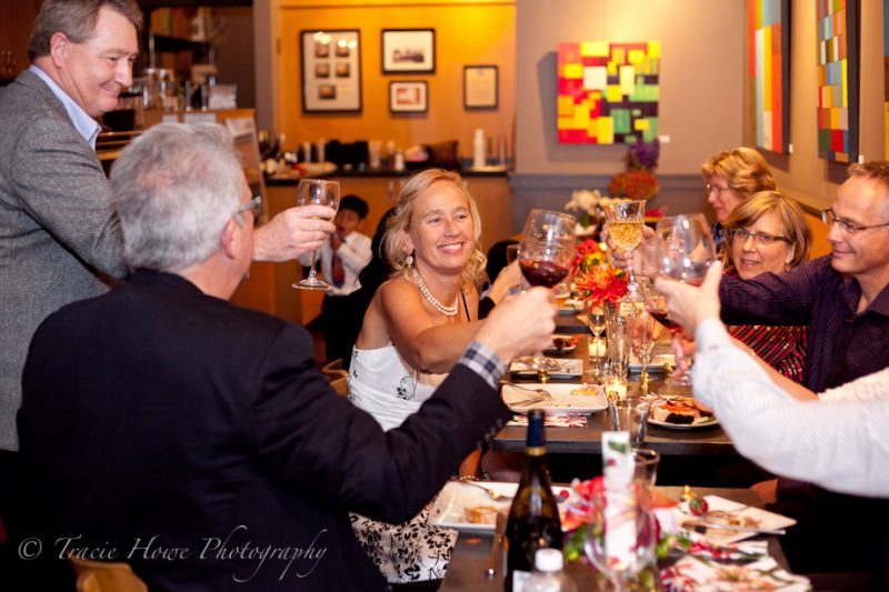 Photo of toasts and cheers at Seattle cafe wedding