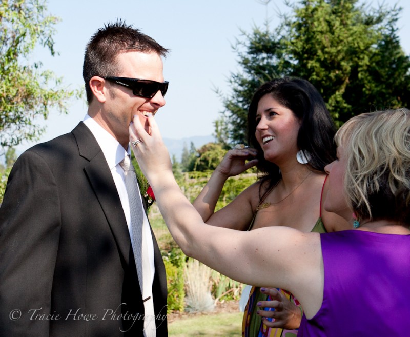 Mom picking the teeth of the groom-to-be
