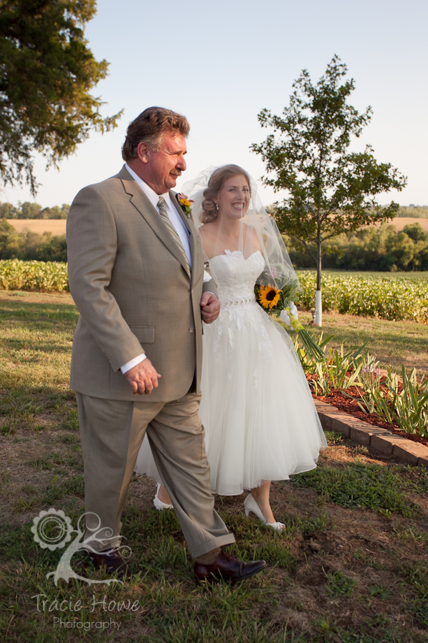 Father walking bride down aisle