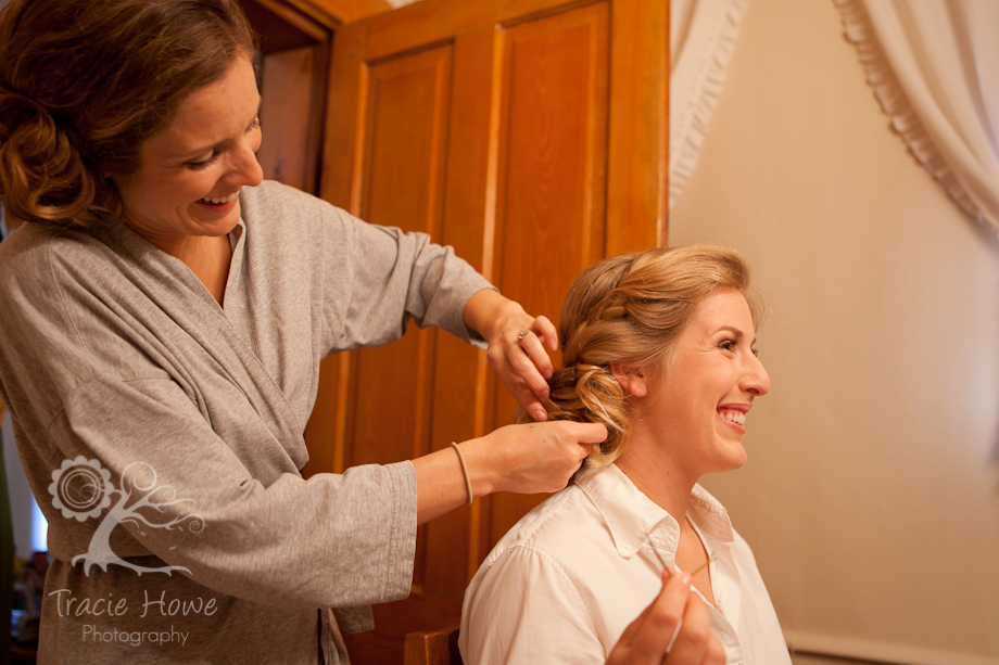 Sister helping bride get ready