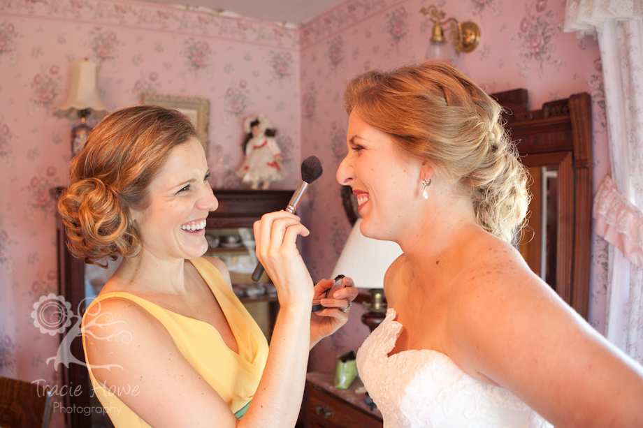 Sister helping bride get ready