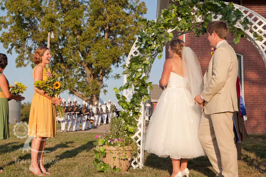 Bride and groom being surprised by a marching band