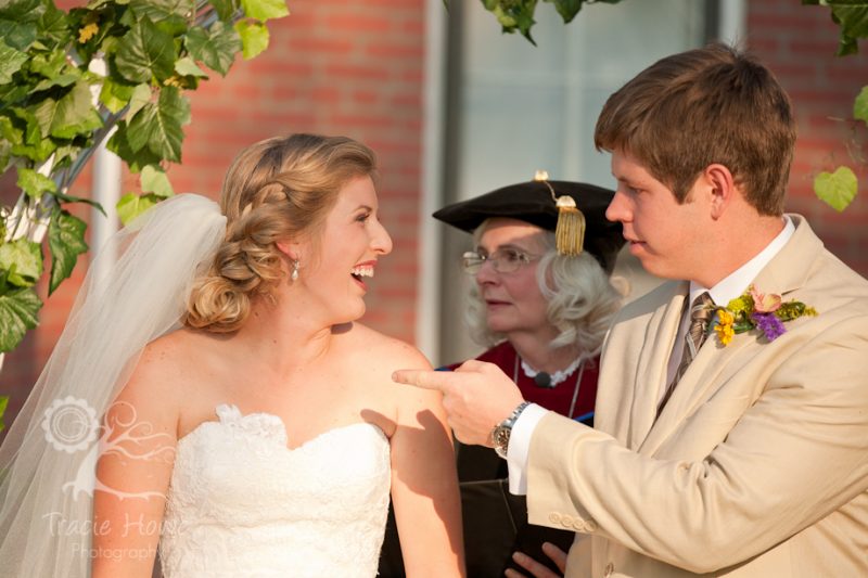 Bride and groom reaction to surprise marching band after ceremony