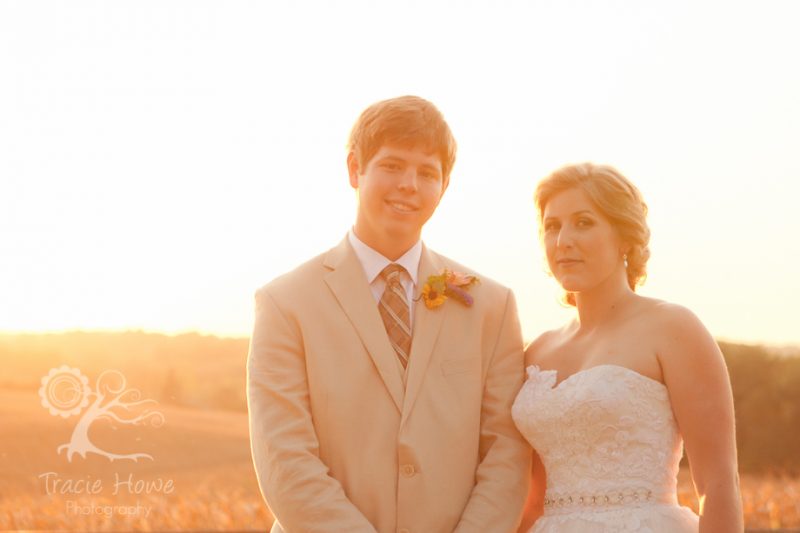 Sunset photo of bride and groom at farm
