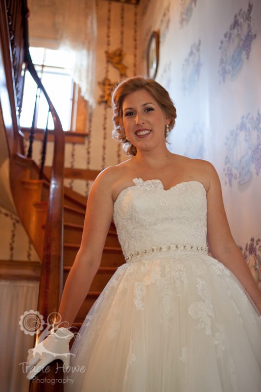 Bride inside historical farmhouse