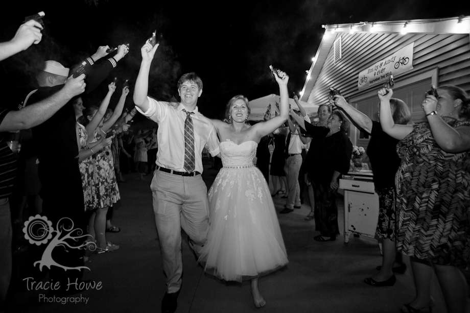 Bride and groom during a cap-gun send off