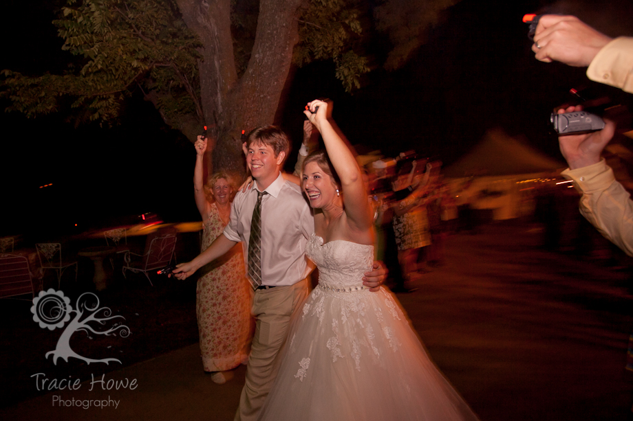 Bride and groom during a cap-gun send off