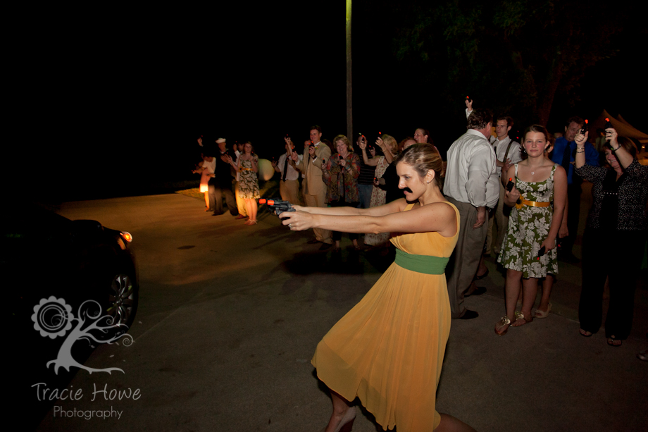 Maid of honor during a cap-gun send off