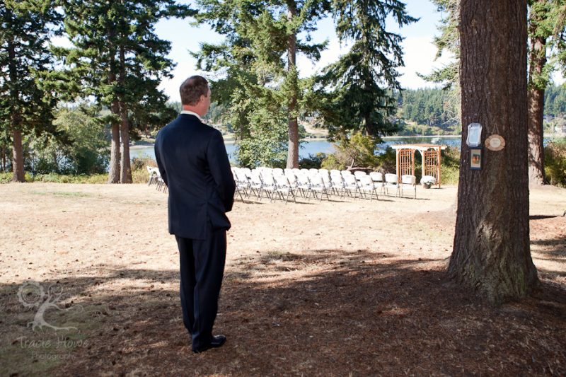 photo of groom waiting for first look