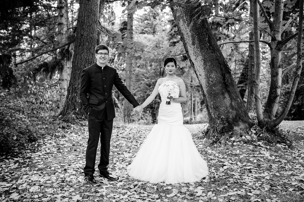 A Chinese-American wedding photo in the woods. 